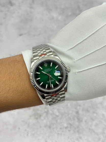 Rolex Datejust wristwatch on steel bracelet, green face with silver bezel details