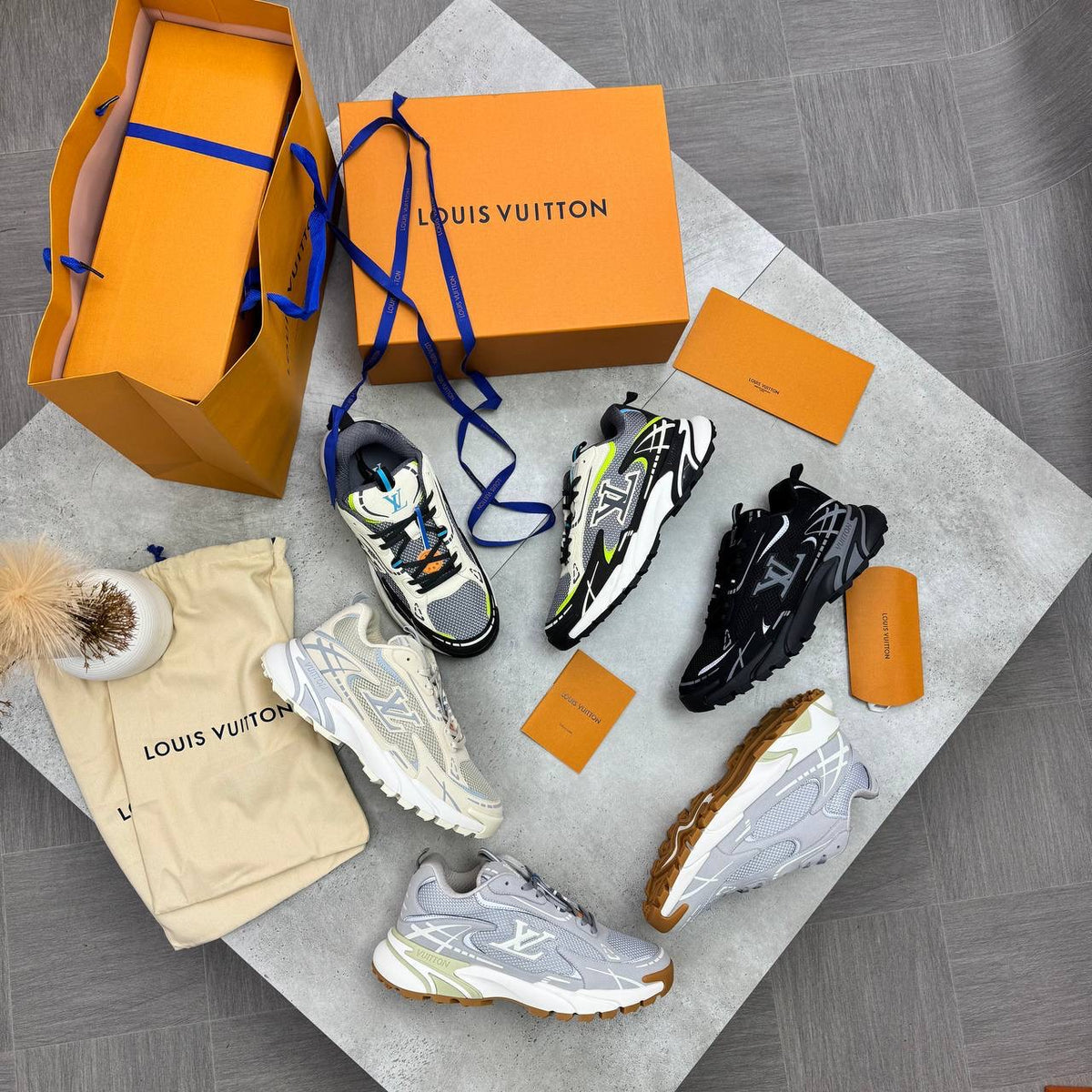 LV Apex runner trainer shoes shown in multiple colorways, with branded boxes