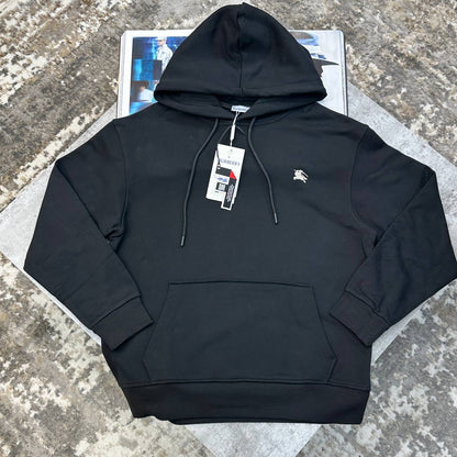 Dark hoodie jumper with hood drawstrings, small horse logo on chest and front pocket