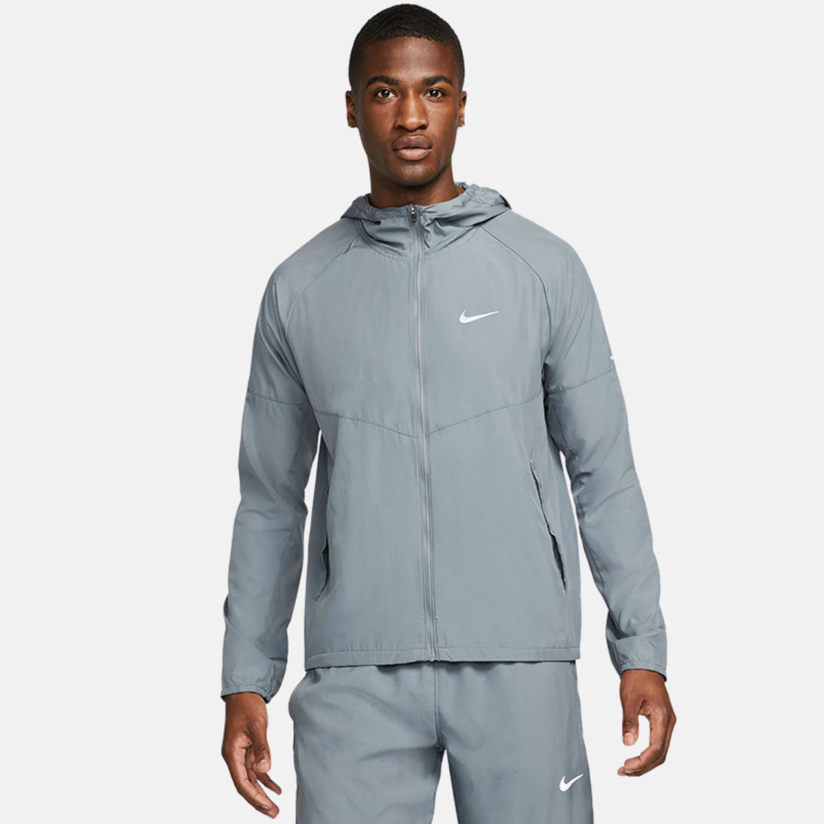 Nike Miler Repel tracksuit hooded zip jacket and jogger pants, light blue