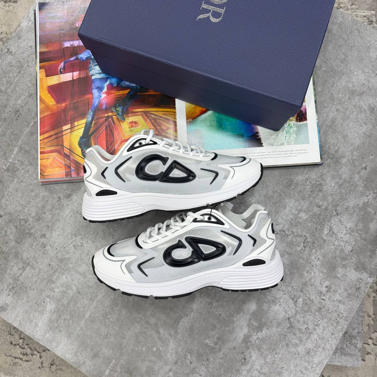 White B-22 futures sneakers with black accents, lace-up and padded sole