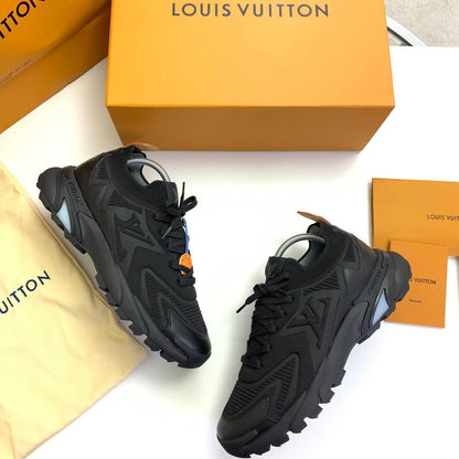 Pair of trainer sneakers, black and dark gray knit uppers with lace-up and thick soles