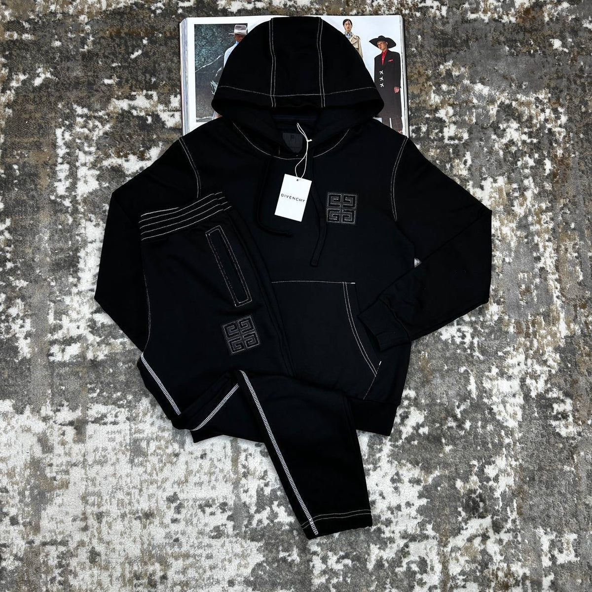 Black 4G motif tracksuit set, front view of hooded sweatshirt and jogger pants with embroidery