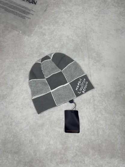LV gray and light gray checkerboard knit beanie with embroidered patch and hang tag
