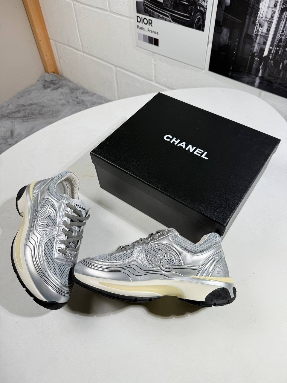 Silver chunky trainers with lace-up front, textured uppers, black outsole