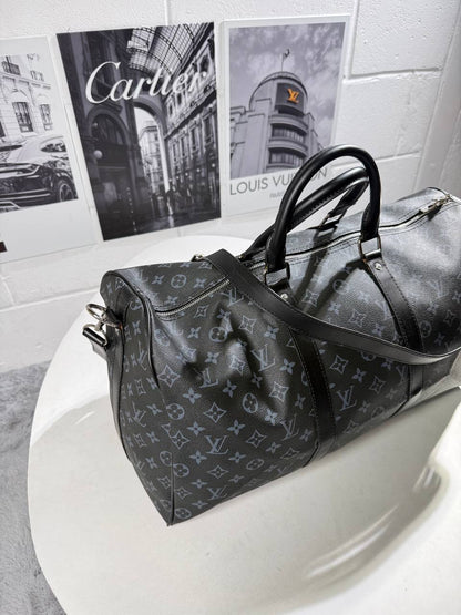 LV monogram carry bag with dual top handles and zippered top, crossbody strap
