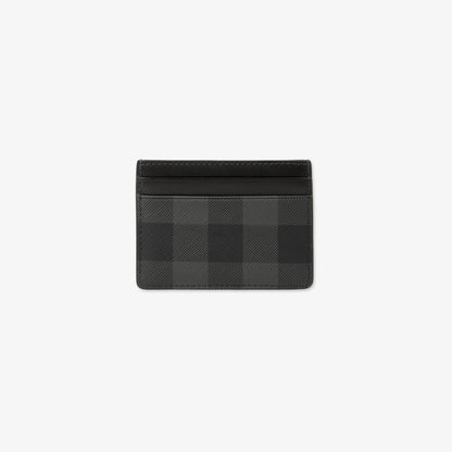 Dark check card case with top card slots, no logo visible
