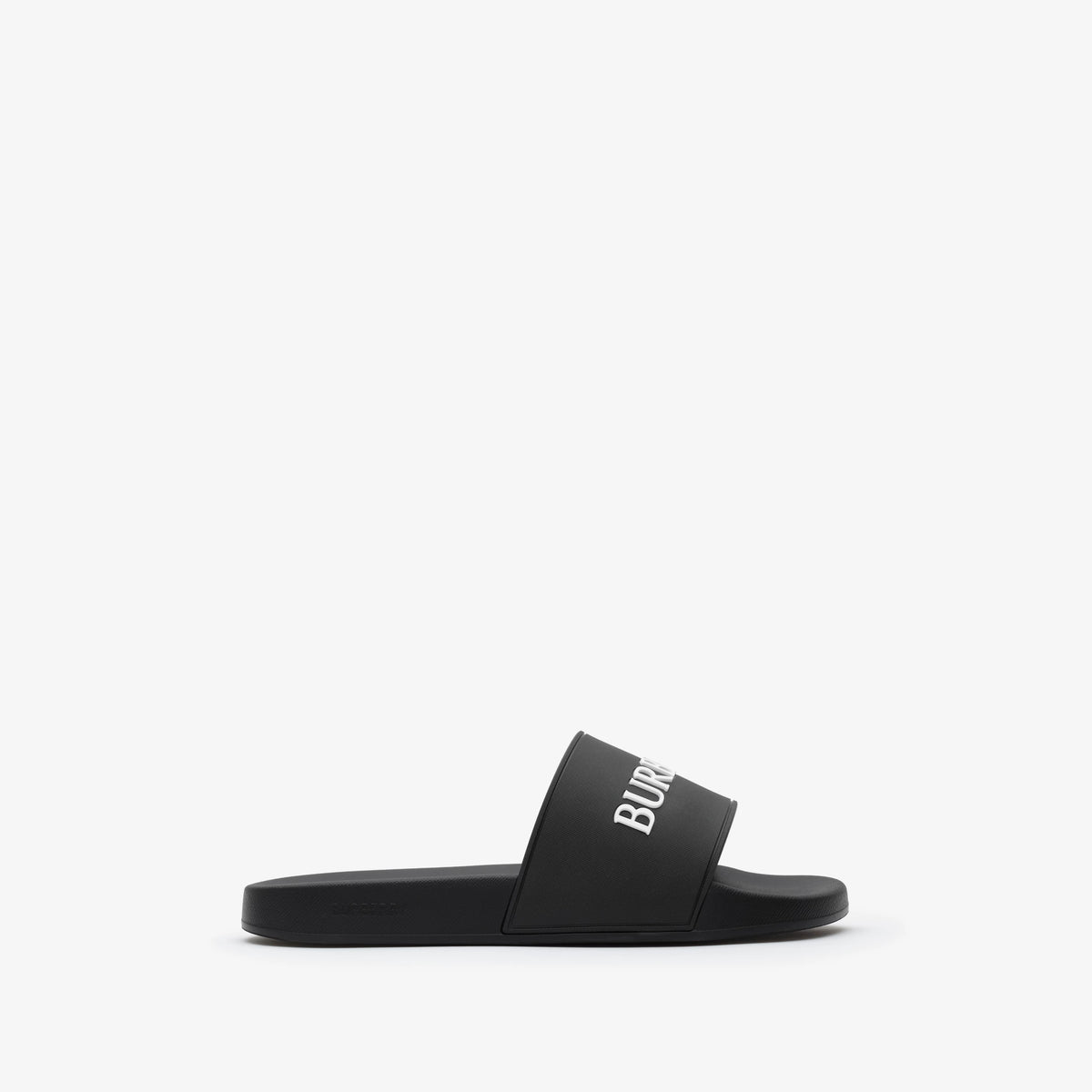 Schwarze Logo-Slides mit weißem BURBERRY-Schriftzug am Riemen