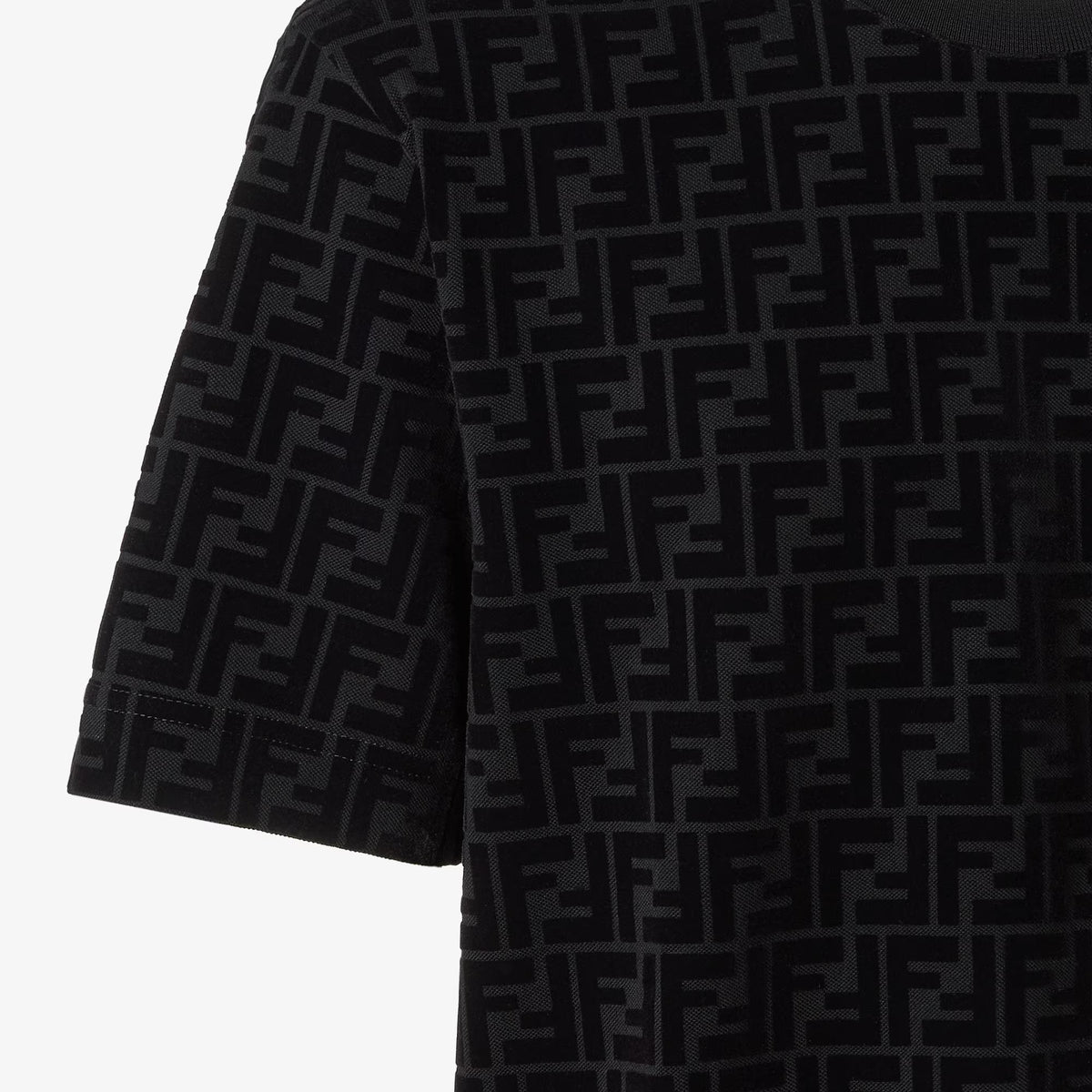 Black cotton T-shirt fabric close-up with repeating logo pattern and short sleeve
