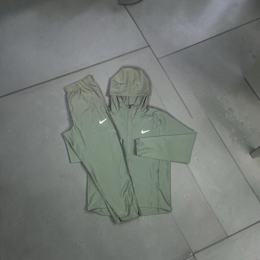 Nike light green zip-up hoodie and matching jogger pants tracksuit set
