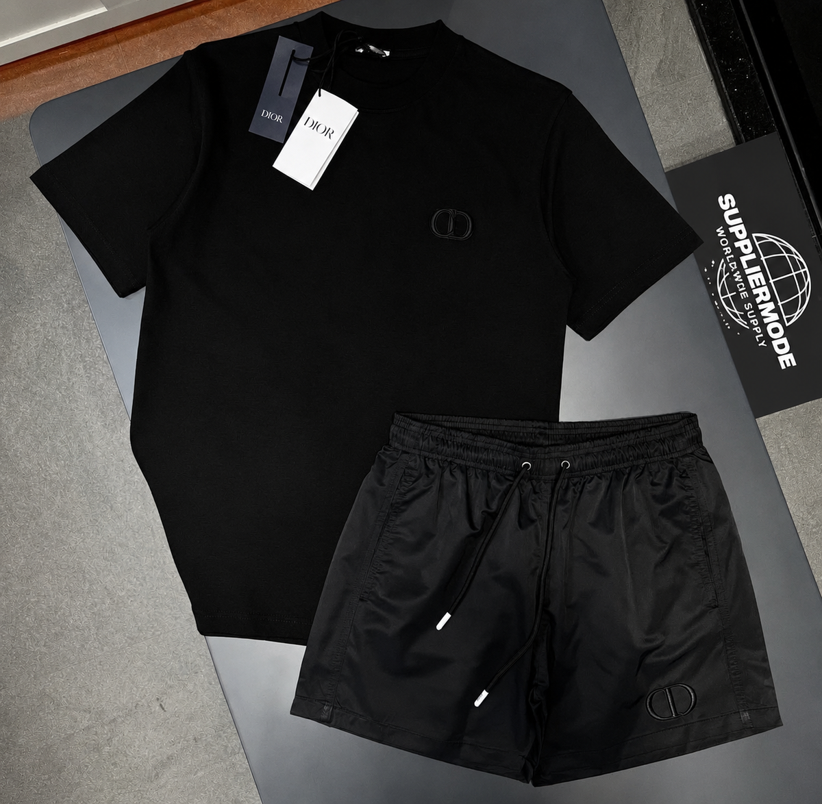 Black T-shirt and shorts set with small chest logo and solid drawstring shorts