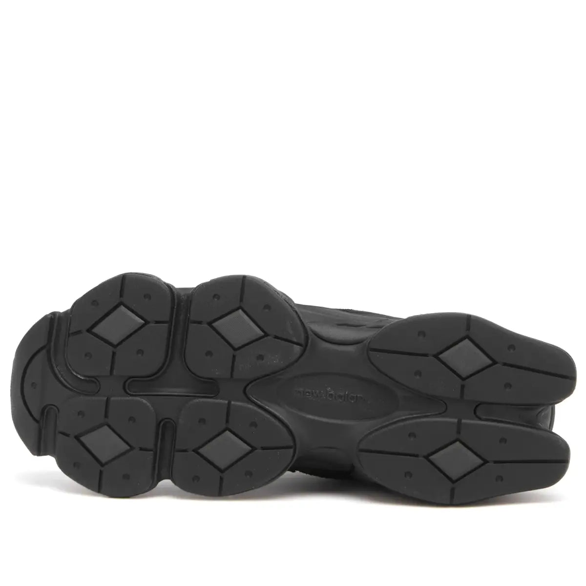 NB 9060 outsole, dark rubber traction tread with geometric pattern