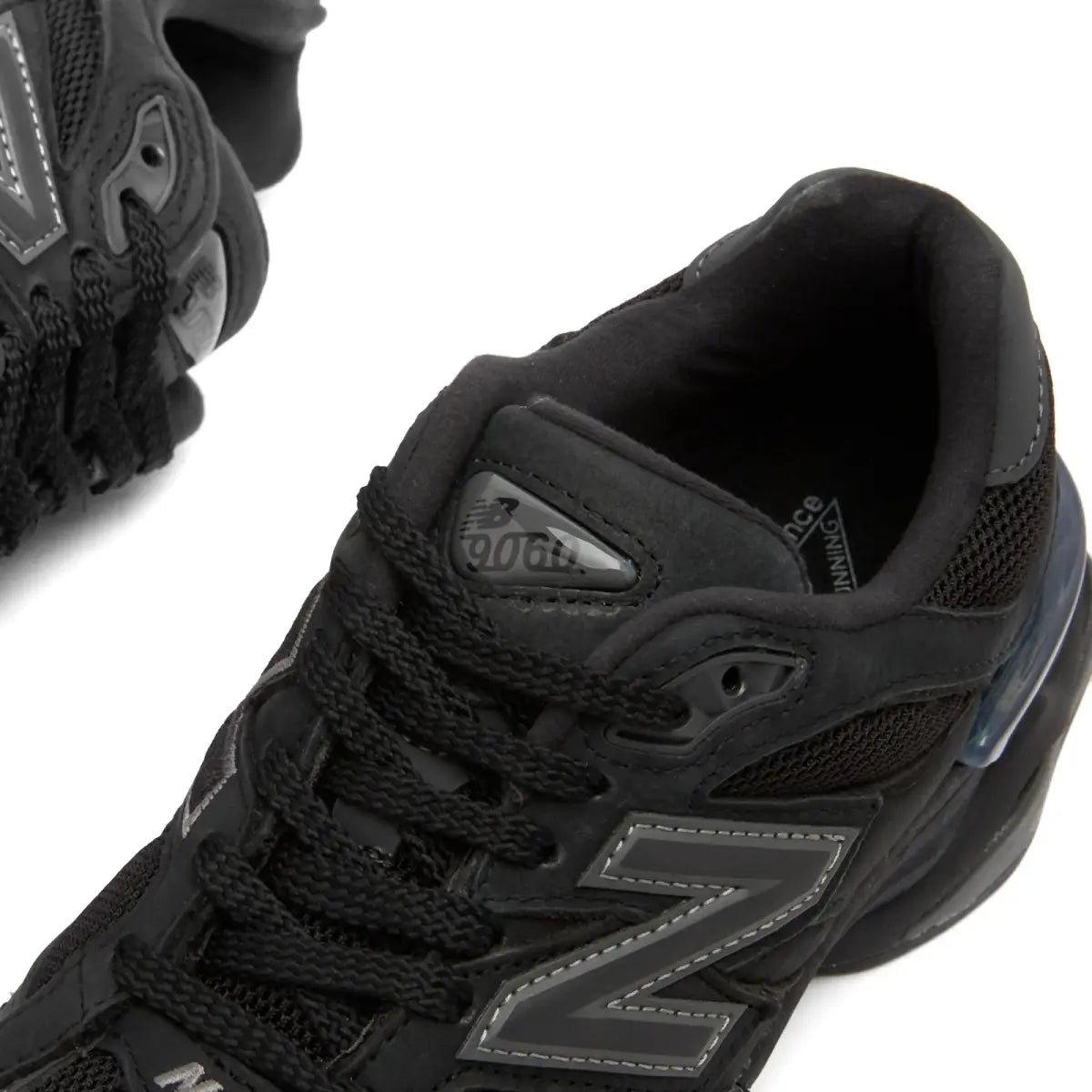 NB 9060 heel and collar detail with cushioned lining and black mesh upper