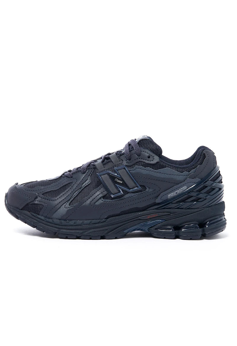 NB Eclipse Navy side view: lace-up athletic shoe with sculpted sole