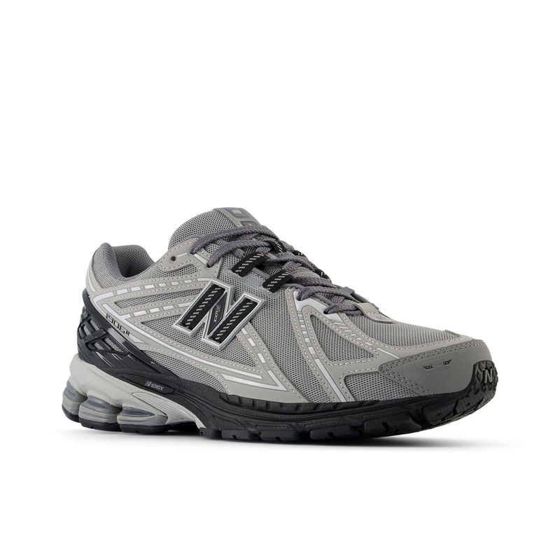 NB 1906R running shoe front three-quarter view, gray fabric with black branding