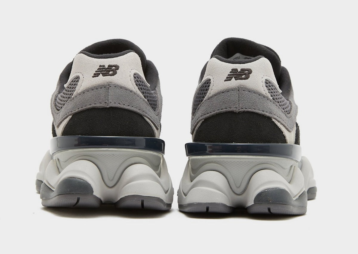 NB 9060 sneakers heel view with black lining, grey upper, and thick white midsole