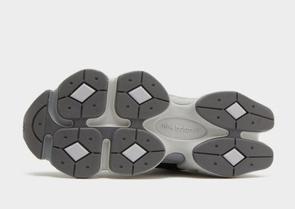 NB 9060 outsole view with grippy rubber tread and “new balance” on midfoot