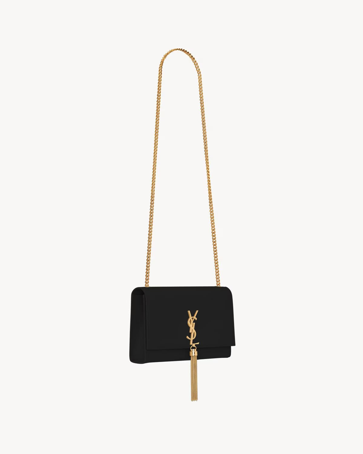 Sac KATE moyen cuir noir gaufré, rabat avec logo YSL, frange dorée