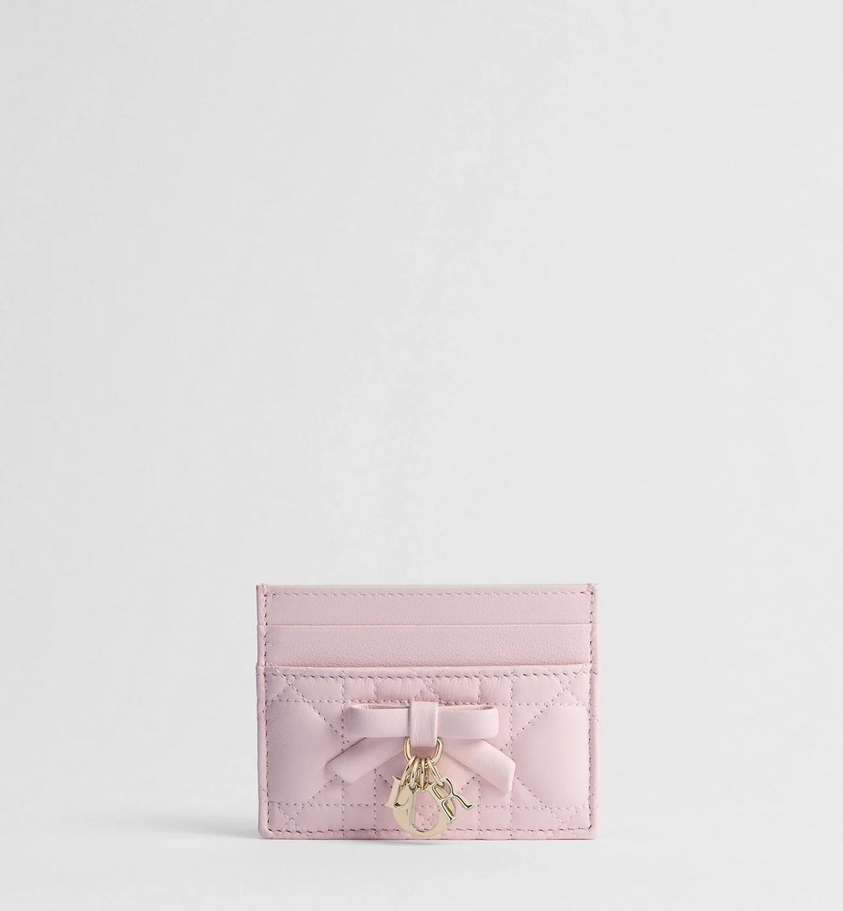 Lady Dior Freesia card holder, pale pink quilted leather with bow charm