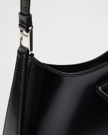 Prada Cleo shoulder bag strap hardware and stitched black leather edge