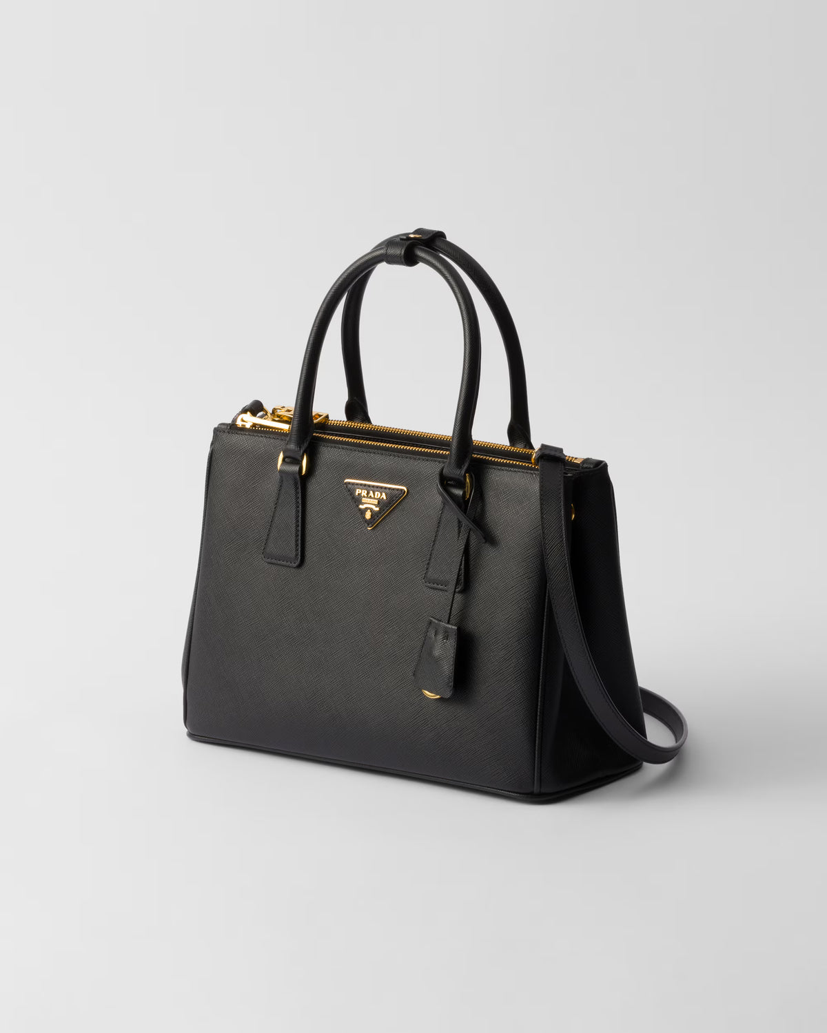 Black medium Galleria Saffiano leather bag with crossbody strap and gold zipper