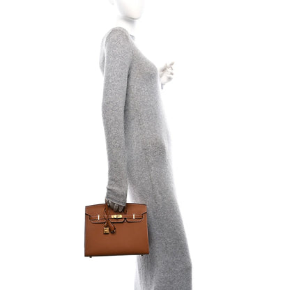 Birkin Sellier 25 braune Handtasche am Körper, mit Verschluss und goldfarbenen Details