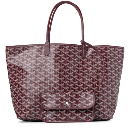 Red Gyard tote bag with top handles and front flap pocket in repeating pattern