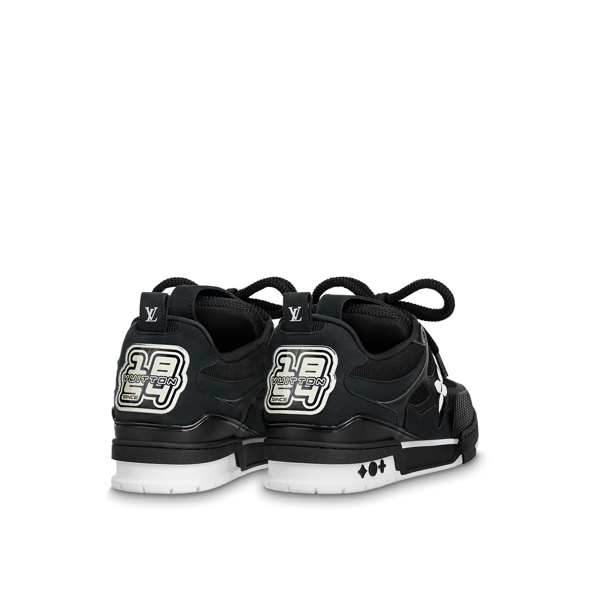 LVE black skate trainers heel view with branded patches and patterned outsole