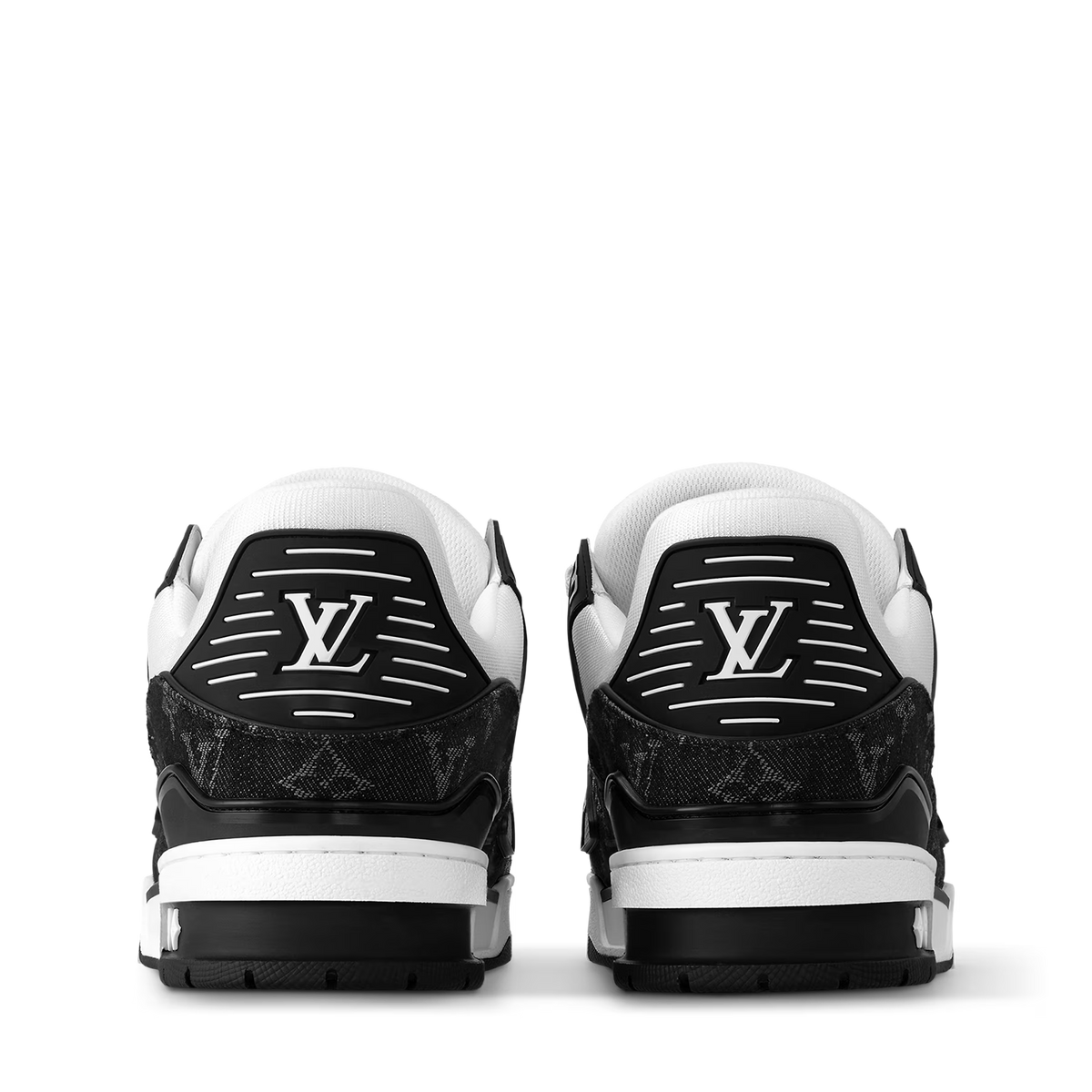 LVE trainer heel view, black logo patch and white midsoles with tread