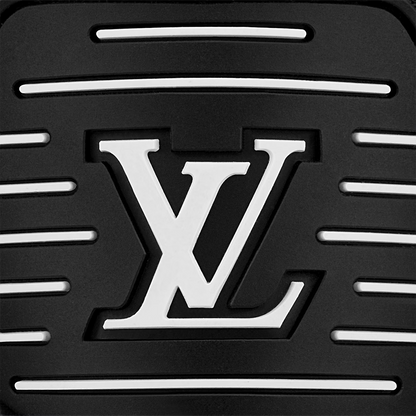 LV Trainer outsole close-up with large LV logo on dark rubber tread