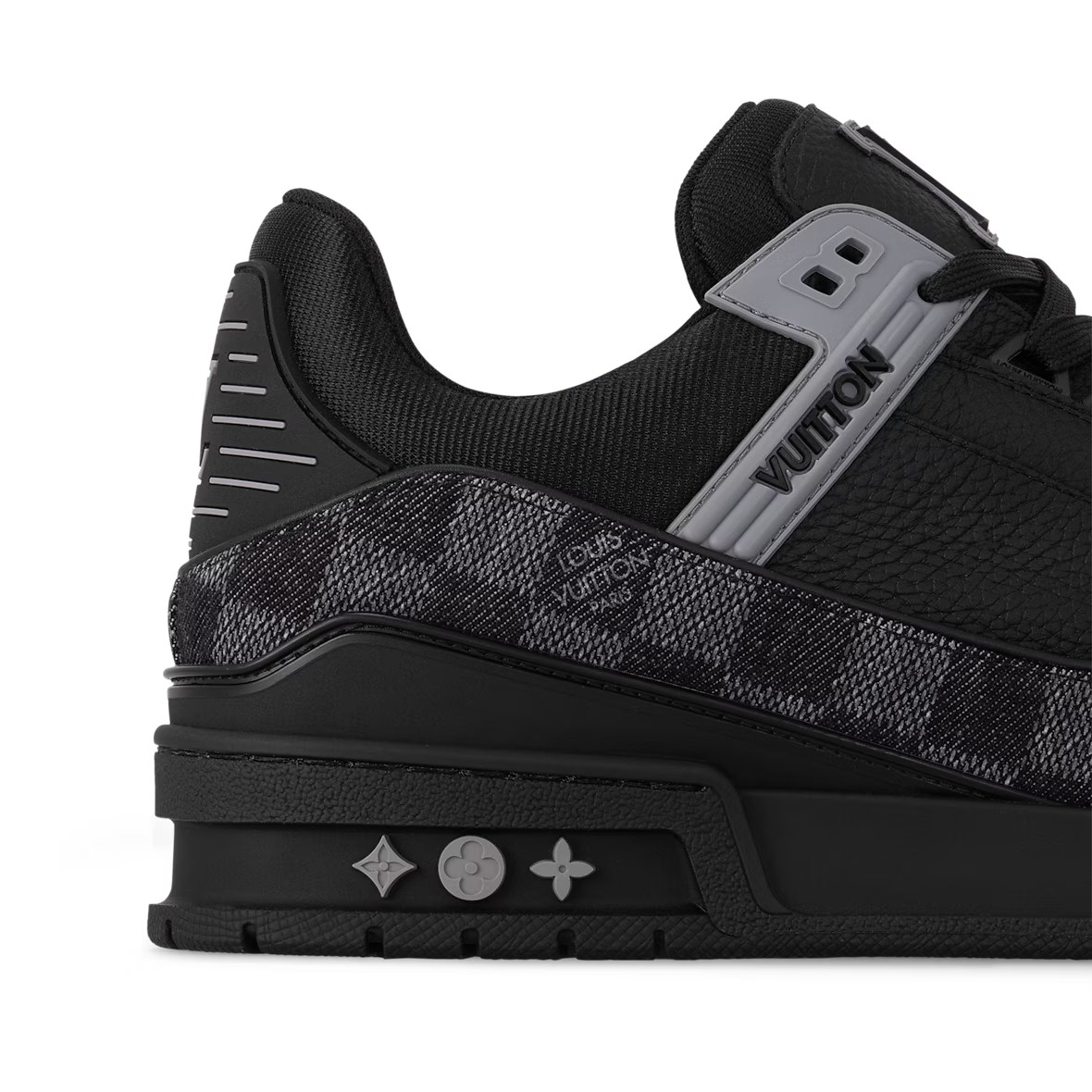 Close-up LV Trainer sneaker: cushioned collar, logo patch and sole