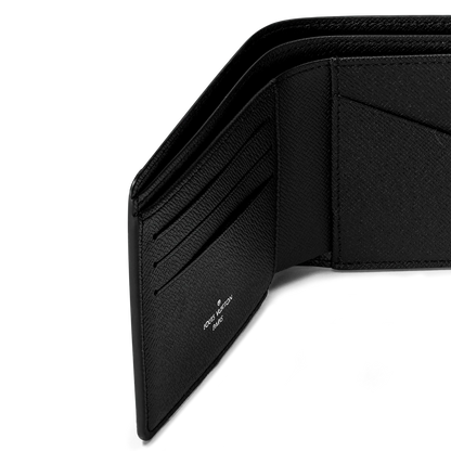 Black wallet interior close-up with multiple card slots and seam detail