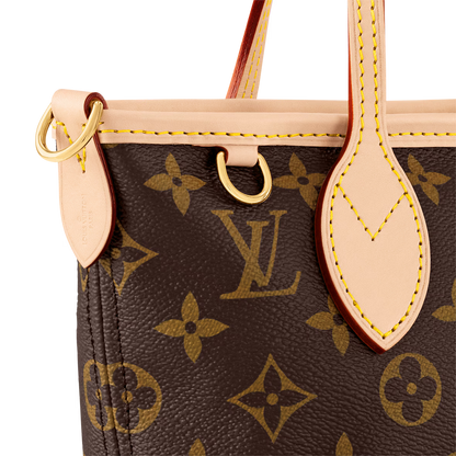 Close-up of Neverfull BB front: monogram canvas, tan leather trim, stitched edges