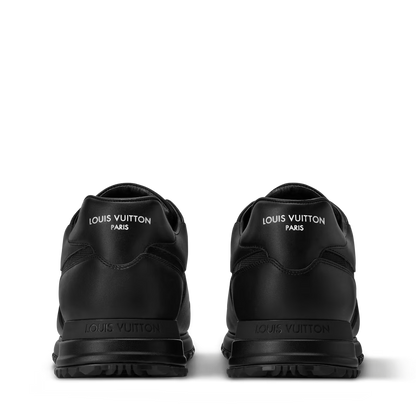 Run Away Sneaker rear view, black leather heel with logo tab and grippy sole