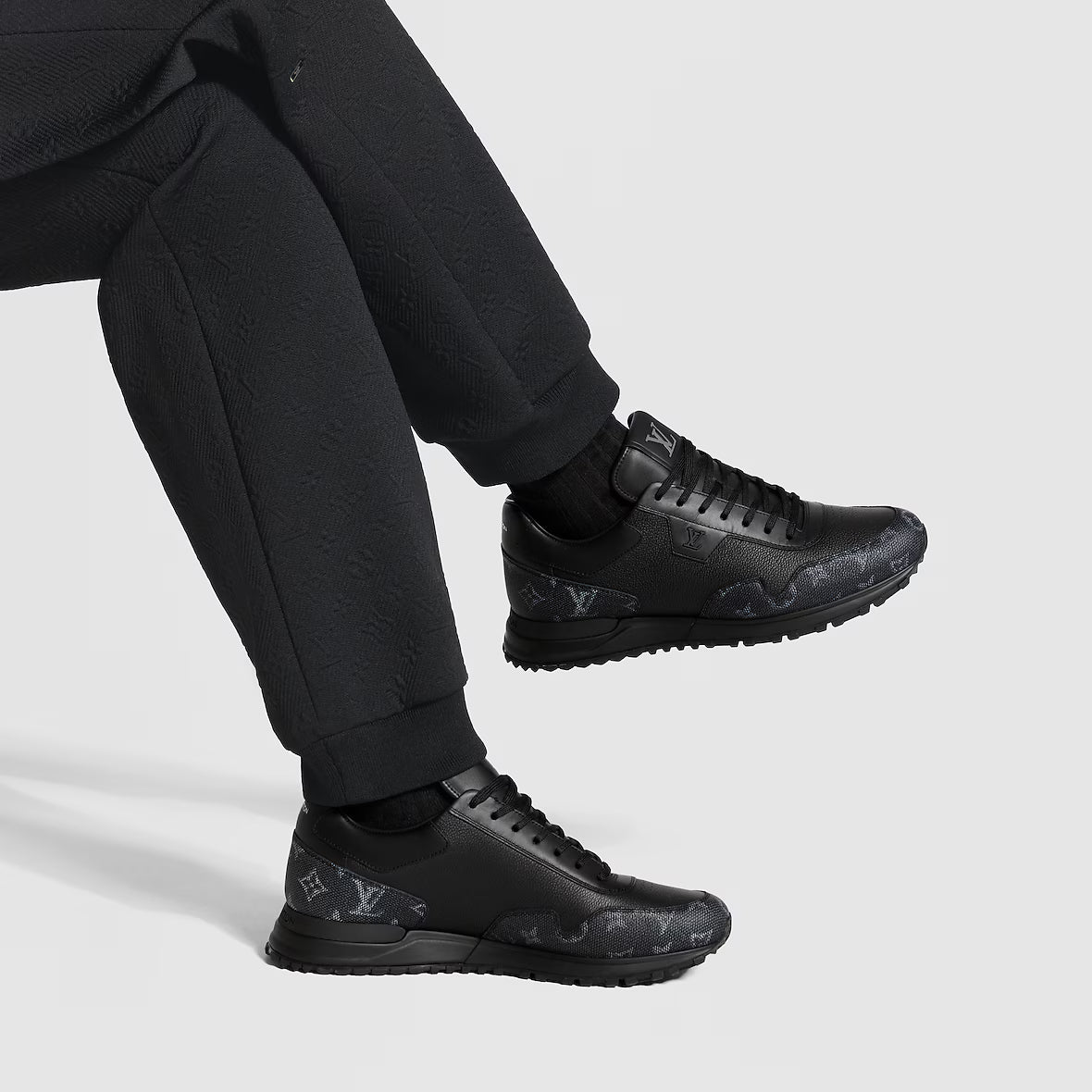 Run Away Trainers black on feet, patterned side panels and lace-up