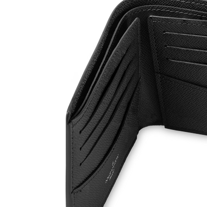 Slender wallet in Monogram Eclipse Reverse with card slots visible inside