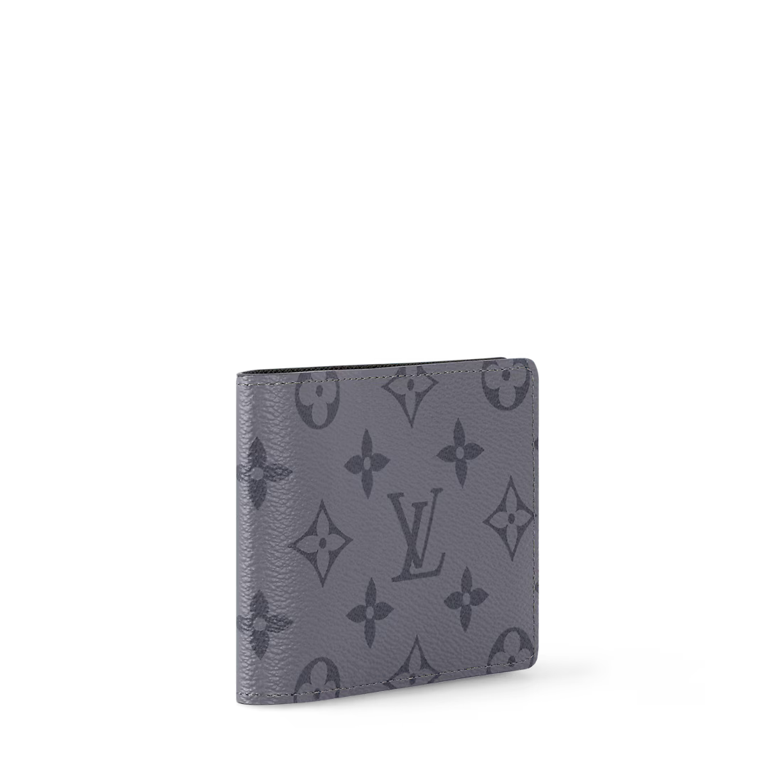 Monogram Eclipse Reverse slender wallet side view with monogram print