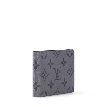 Monogram Eclipse Reverse slender wallet side view with monogram print