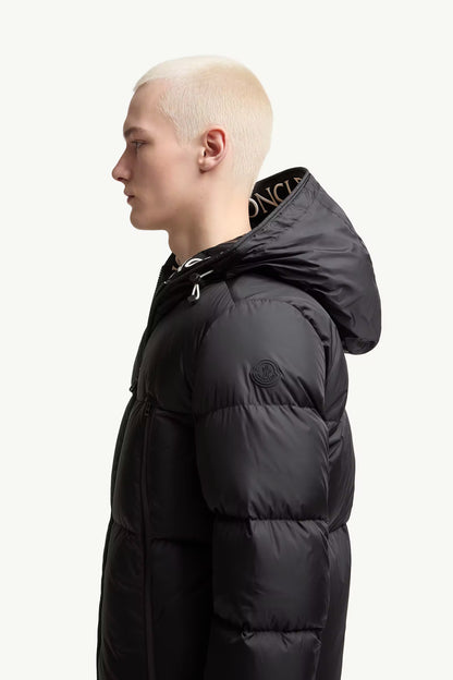 Black Montcla short down jacket from side view, padded hood and zip pockets